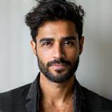 Headshot of artist Amit Desai.